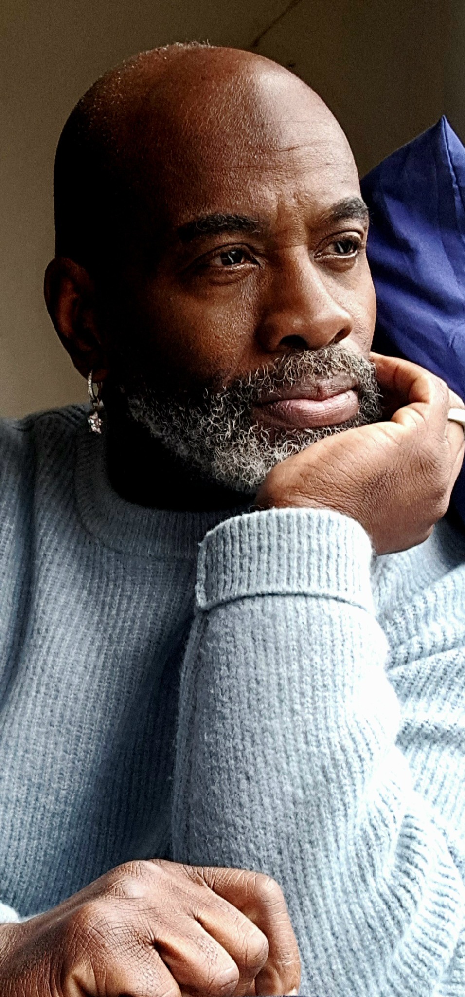 Heverton Reid in grey knitwear