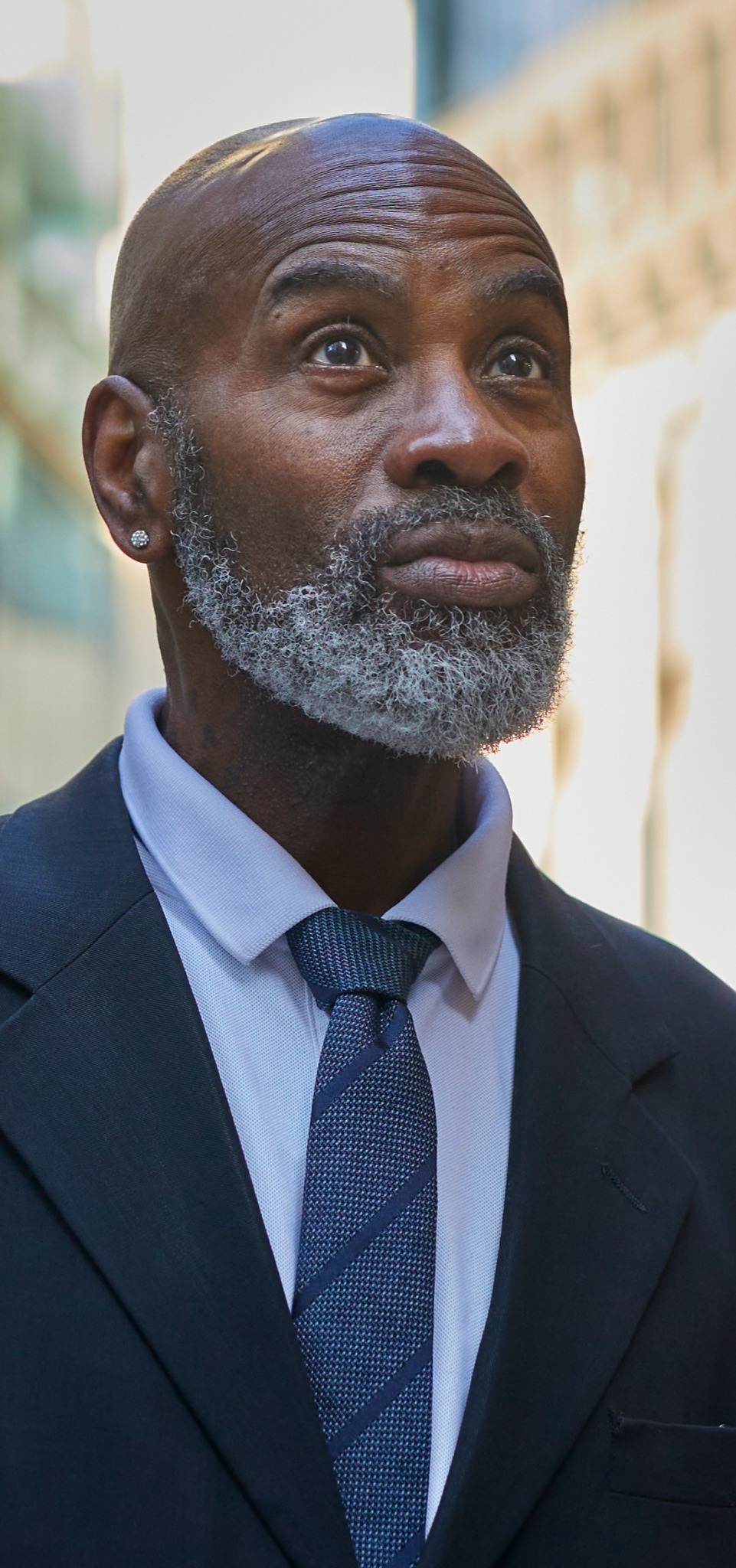Heverton Reid in a navy suit