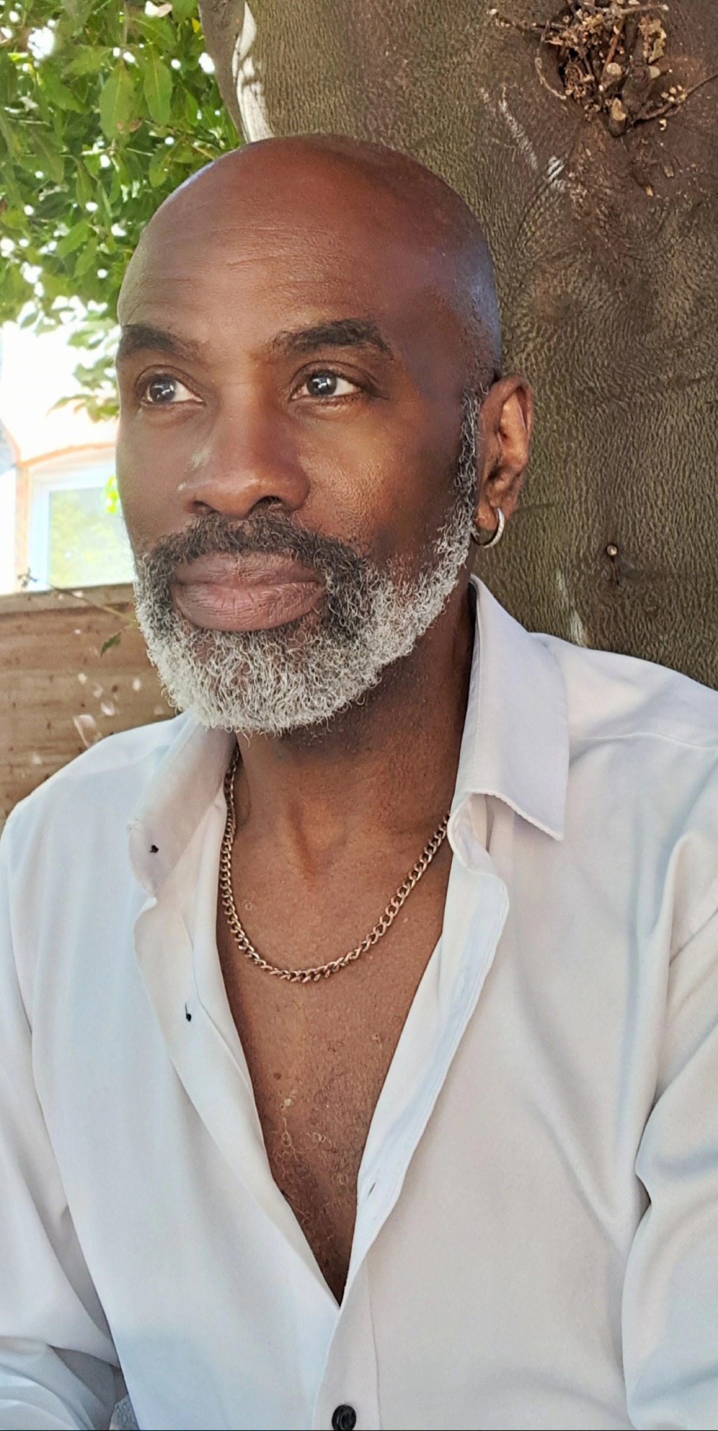 Heverton Reid in a white shirt